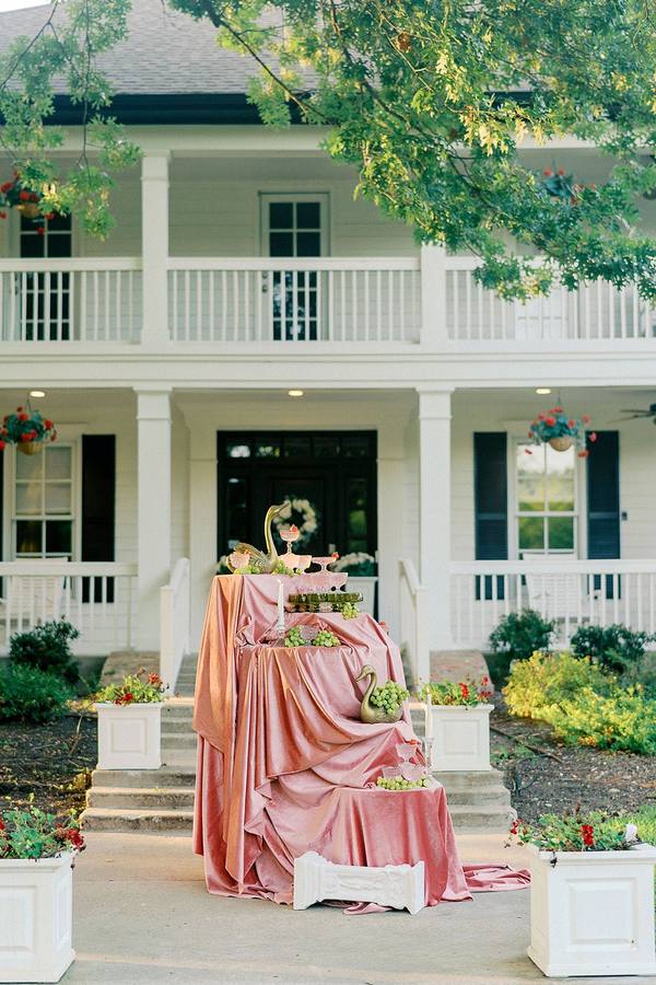 Styled table on the front walk of The Manor at River Road